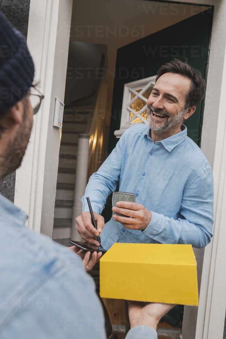 Image of a happy customer receiving a package, symbolizing customer satisfaction. 